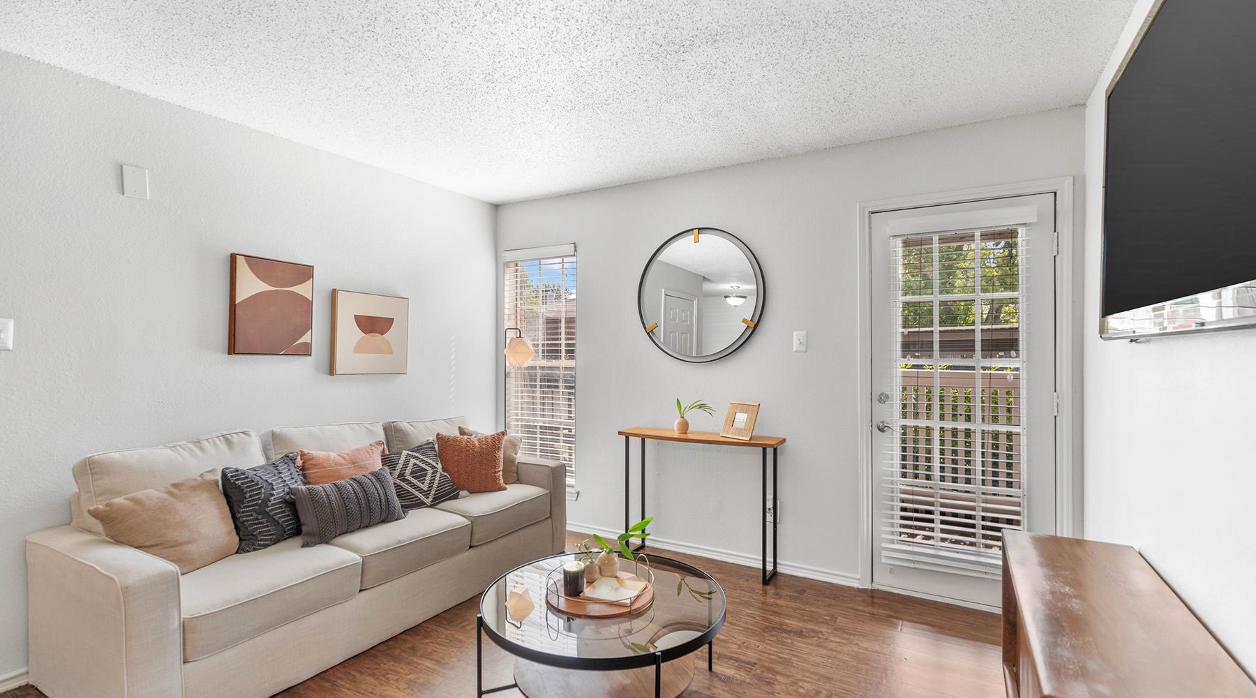 living room with couch coffee table and tv
