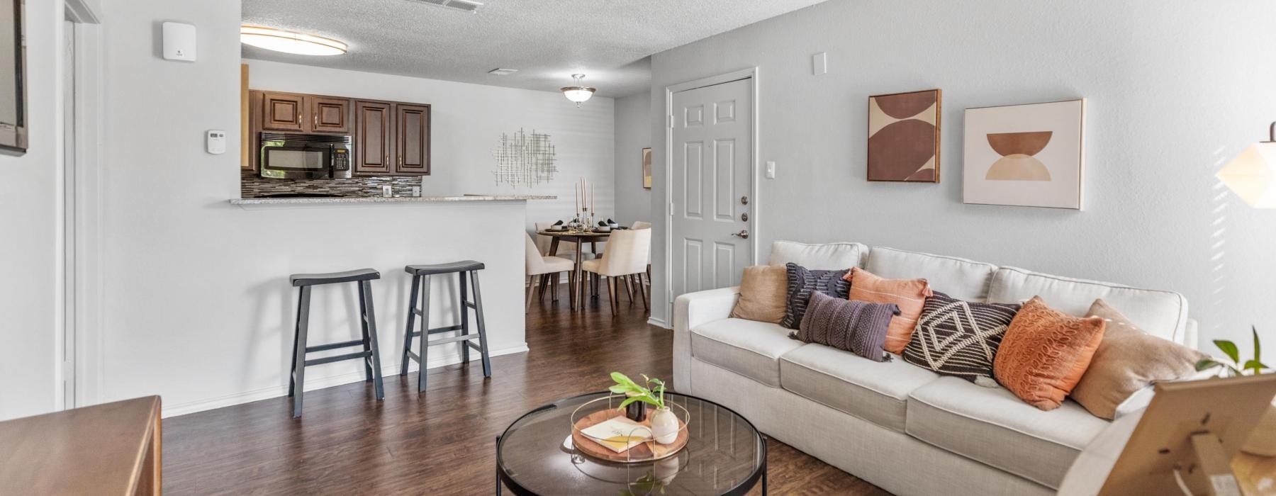 a living room with a couch and a table