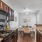 a kitchen with a stove microwave and sink